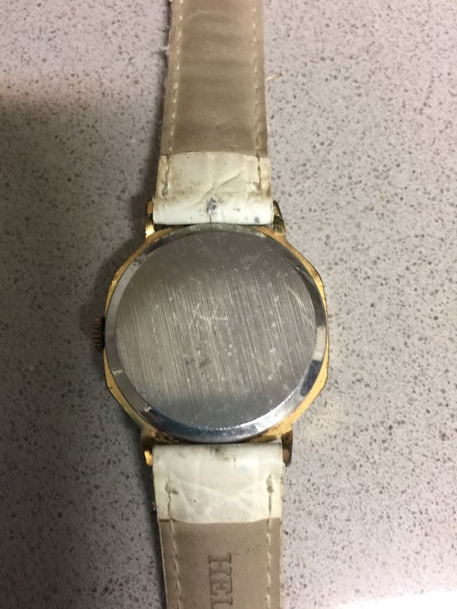 Reloj duward, años 70,octogonal, chapado oro.