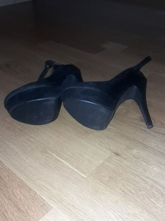 Zapatos tacón alto.