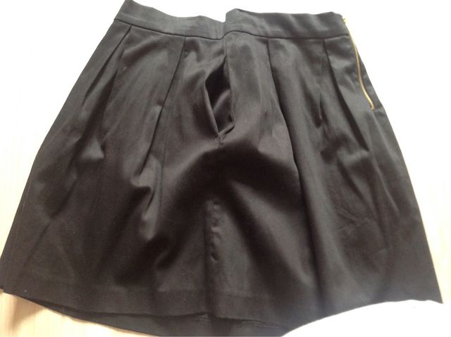 Minifalda NUEVA negra vuelo y bolsillos 38 40 