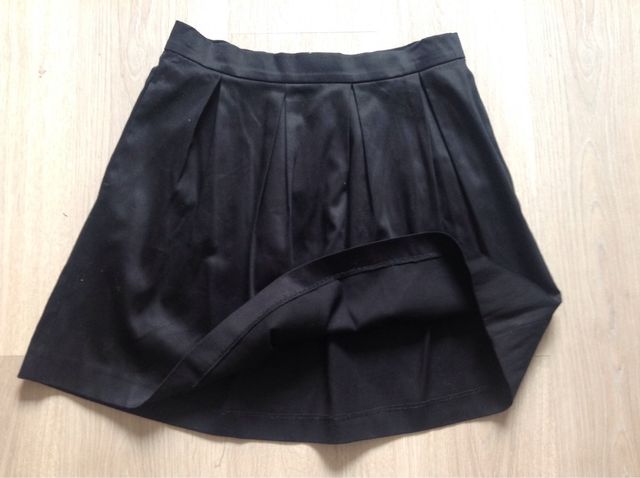 Minifalda NUEVA negra vuelo y bolsillos 38 40 