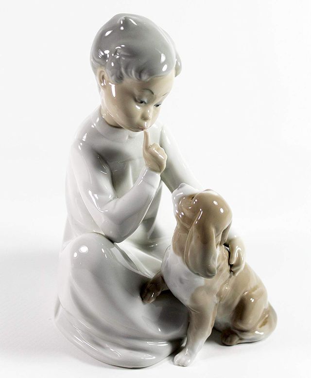 Lladro figurina niño con pero