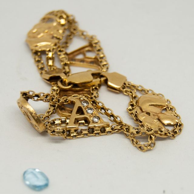 Pulsera AROA, elefantes y circonitas, de oro 18Q