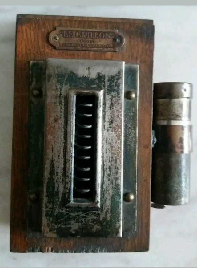 Mecheros antiguos de pared,