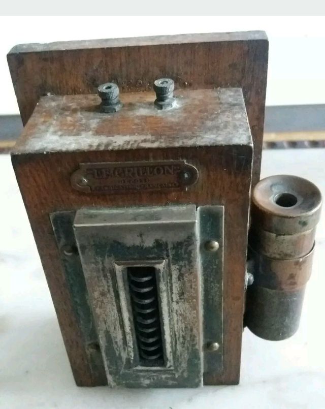 Mecheros antiguos de pared,