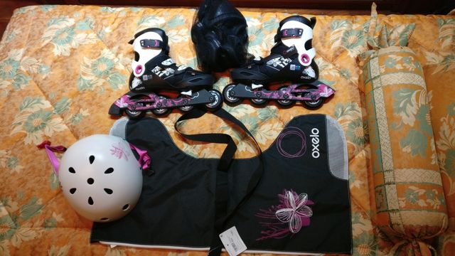 Patines, casco, coderas, rodilleras y bolsa transp