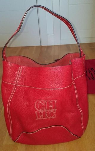 Bolso Carolina Herrera original piel rojo nuevo de segunda mano por 250 EUR  en Villanueva de la Cañada en WALLAPOP