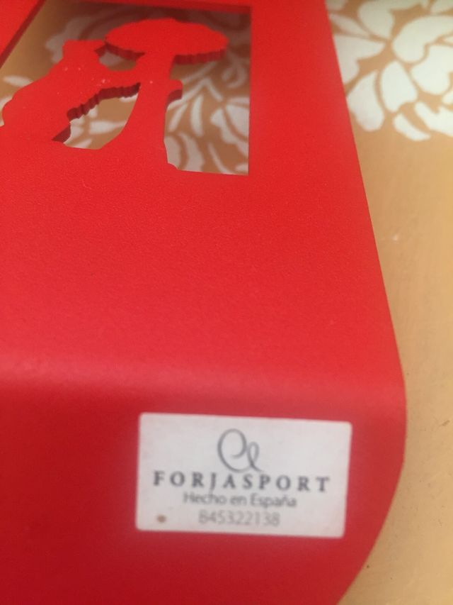 Sujeta botellas, adorno