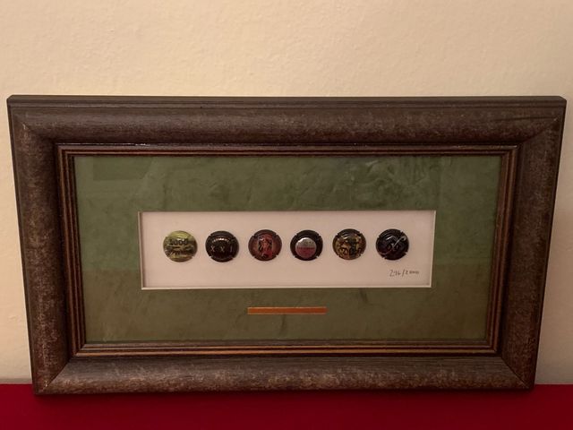 Cuadro de chapas de cava.