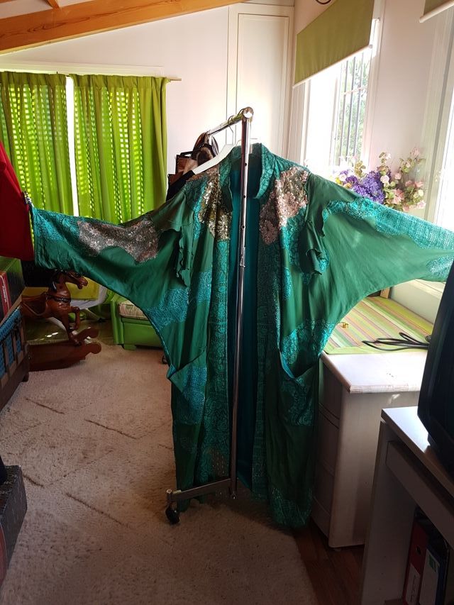 Abrigo de piel verde de fantasia