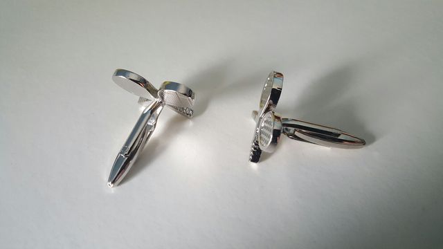 Gemelos raqueta tenis