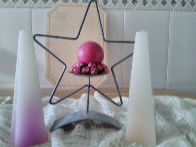 Portavelas de metal.