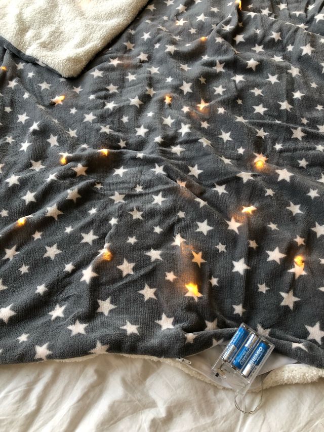 Manta de estrellas luminosa