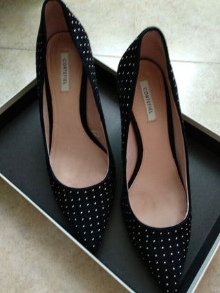 Zapatos de salón Cortefiel con tachuelas número 39 de segunda mano por 25  EUR en Aranjuez en WALLAPOP