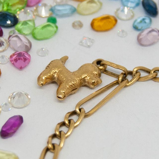 Pulsera tipo cartier figuras de animales, oro 18Q.