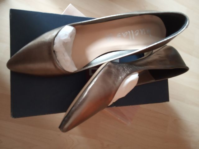 zapatos de un solo uso ,cuero y piel