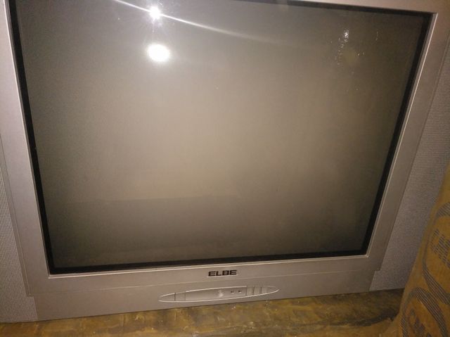 televisor plana de bombo atrás