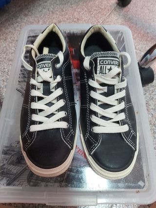 converse negros cuero