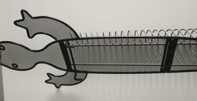 Torre CD con forma de lagarto