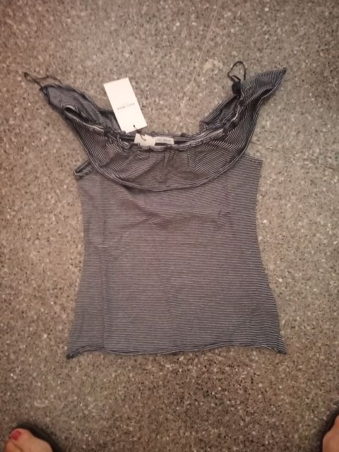 camiseta hombros nueva