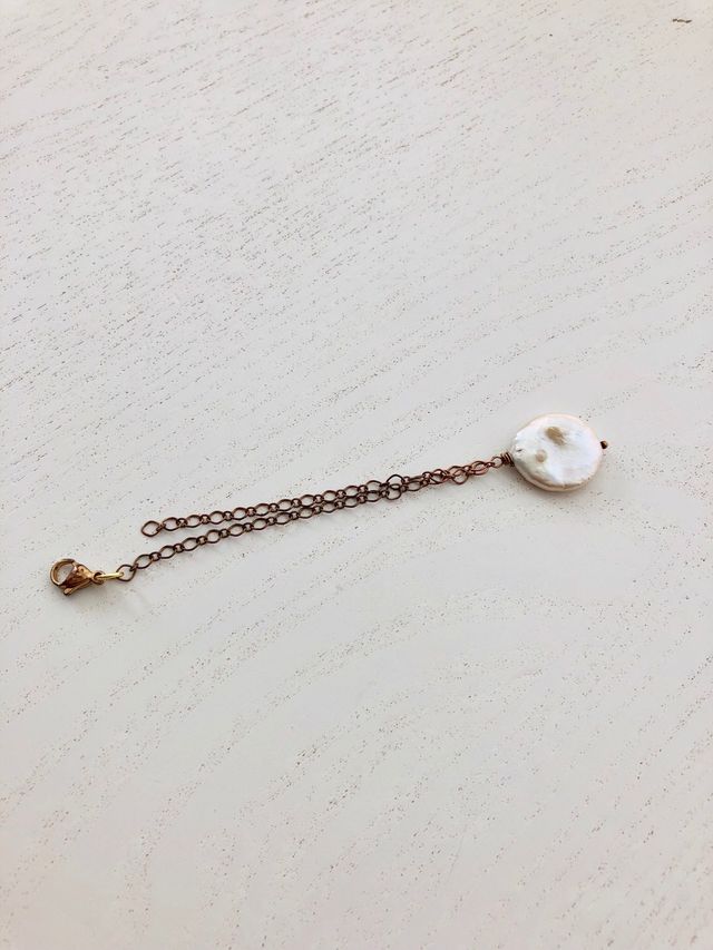 Pulsera con colgante perla