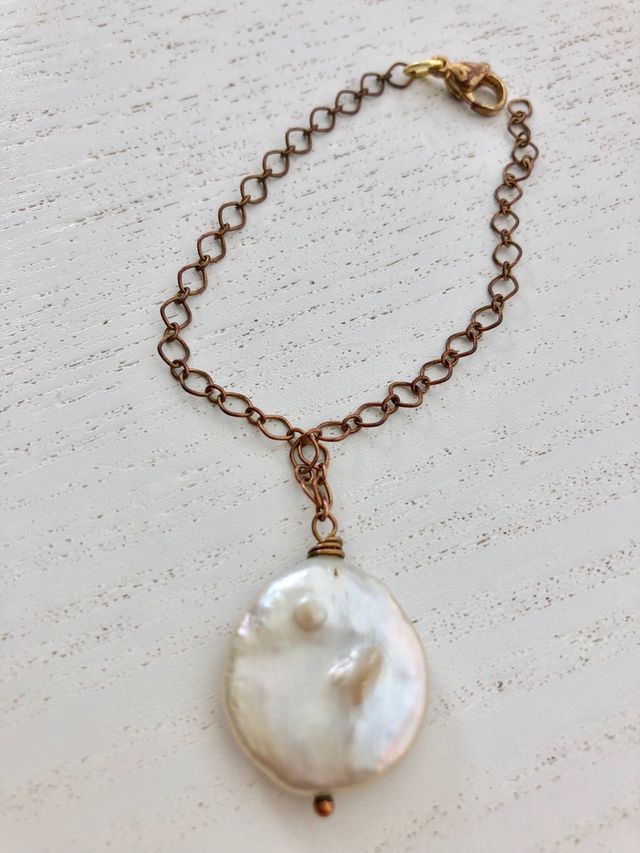 Pulsera con colgante perla