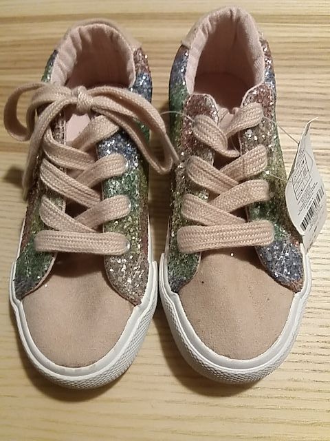 Zapatillas purpurina. Niña.Talla 27. Nuevas