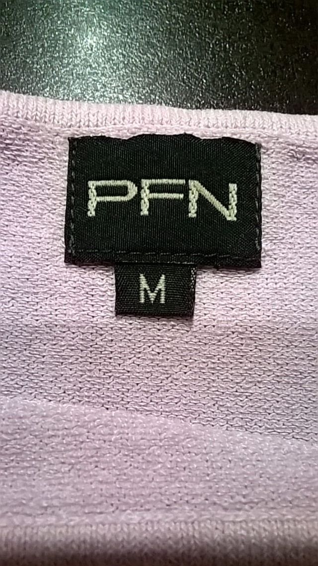 Top de punto rosa pastel