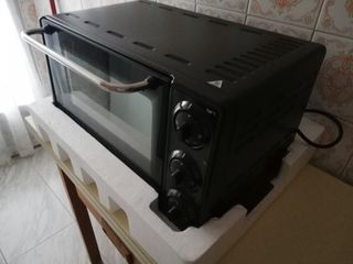 Horno Eléctrico DeLonghi EO20312 A estrenar de segunda mano por 58 EUR en  Madrid en WALLAPOP