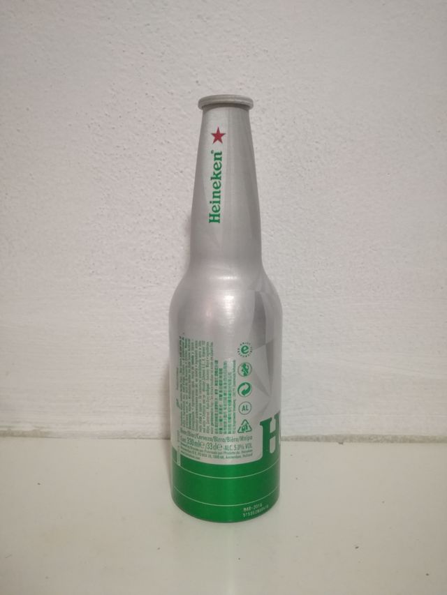 botellin vacio de aluminio de cerveza heineken