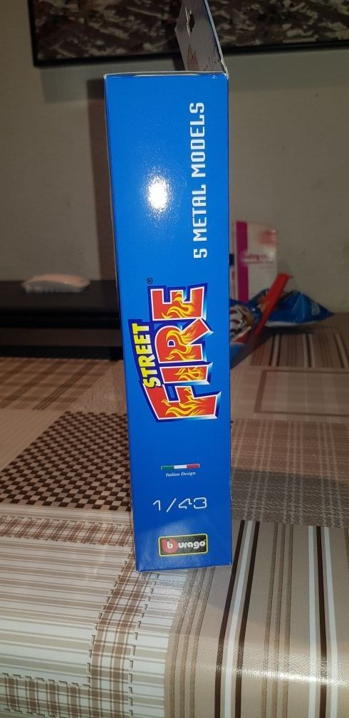 Coches Burago a escala.