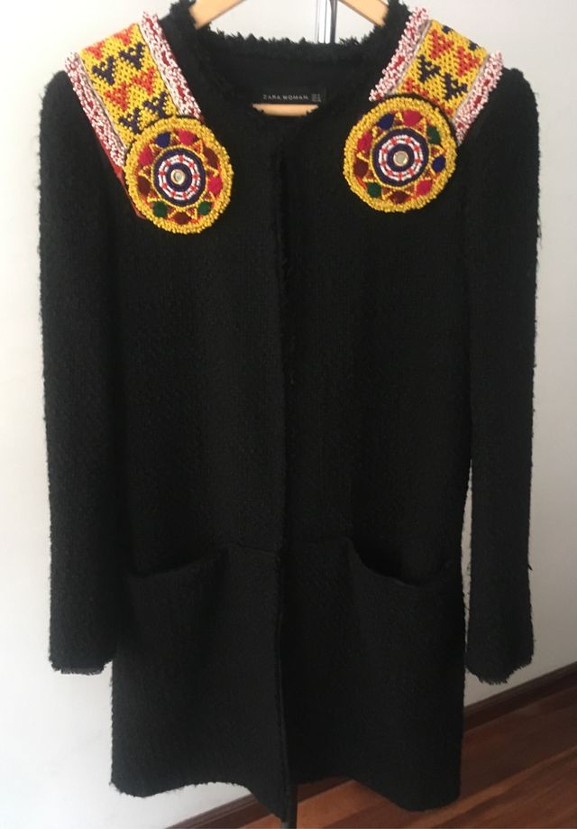 Abrigo tweed y banjara