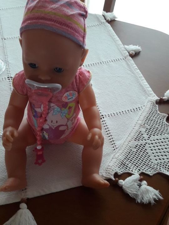 vendo baby born rosa nuevo