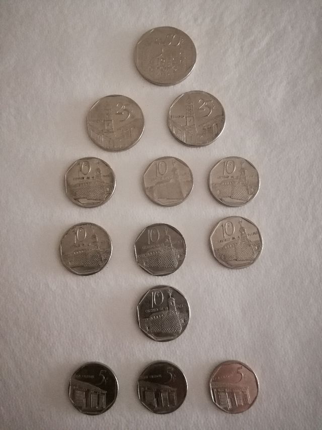 Monete spagnole, inglesi, francesi e cubane.