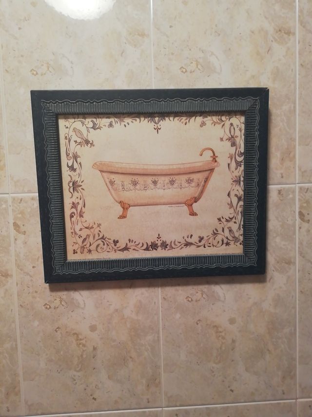 Cuadros pareja con marcó azul tallado