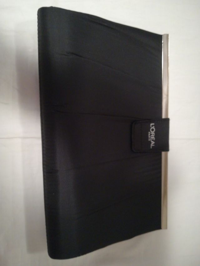 Bolso de mano negro. Cartera