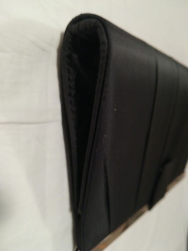 Bolso de mano negro. Cartera