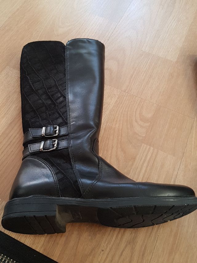 Botas altas piel negras