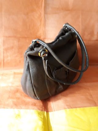 Bolso piel marca Cats de segunda mano por 33 EUR en Madrid en WALLAPOP