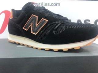 new balance 373 negras y doradas mujer