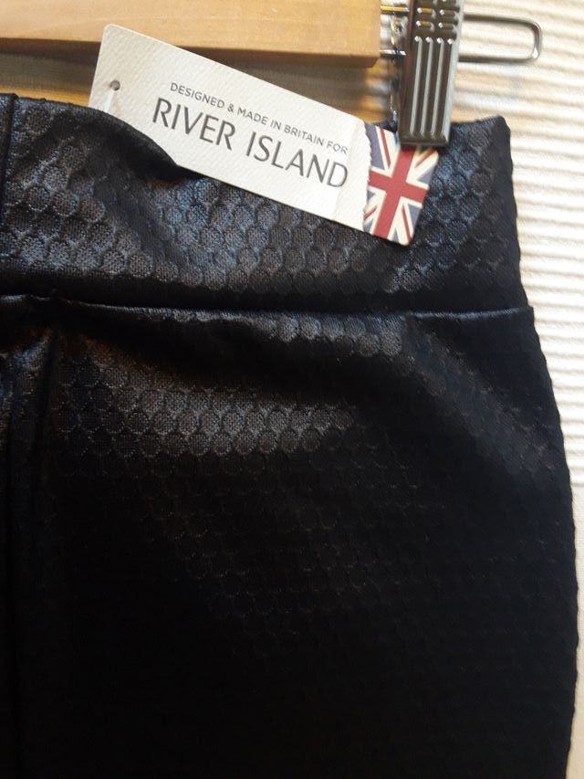 Lote falda de tubo negra a estrenar y top cadena