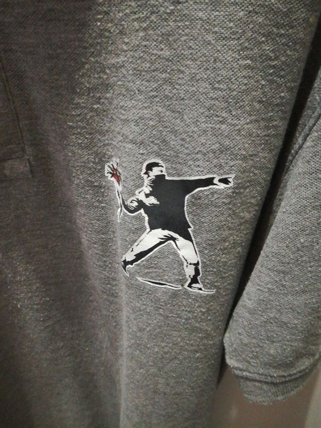Banksy grafiteros. Polo talla M