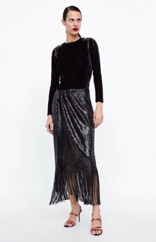 Falda negra flecos lentejuelas ZARA (Talla XS) de segunda mano por 45 EUR  en Madrid en WALLAPOP