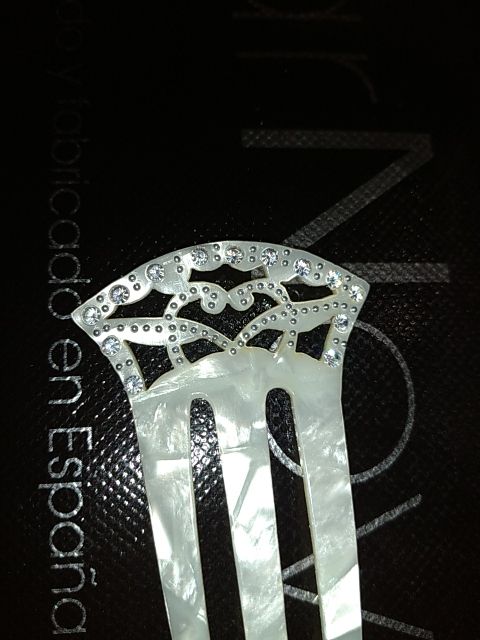 juego de peinas de nácar.