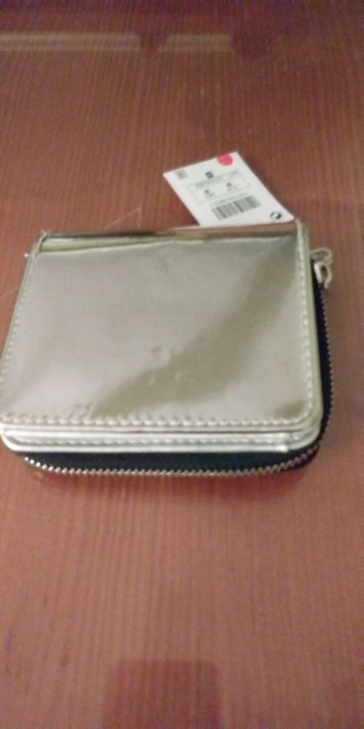 cartera plateada