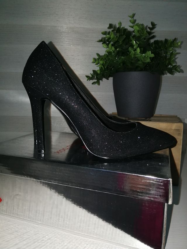 stiletto negro destellos