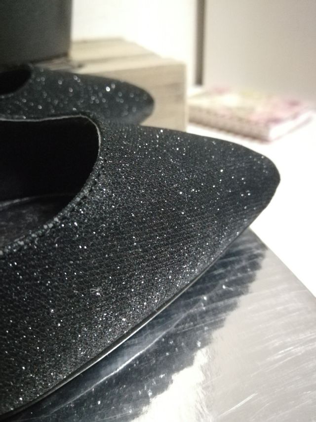 stiletto negro destellos