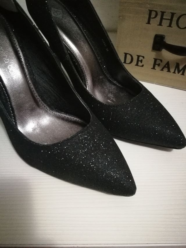 stiletto negro destellos