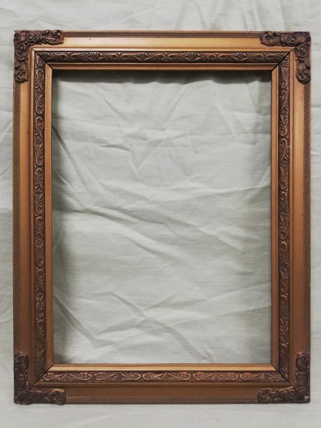 Marco de fotos antiguo dorado