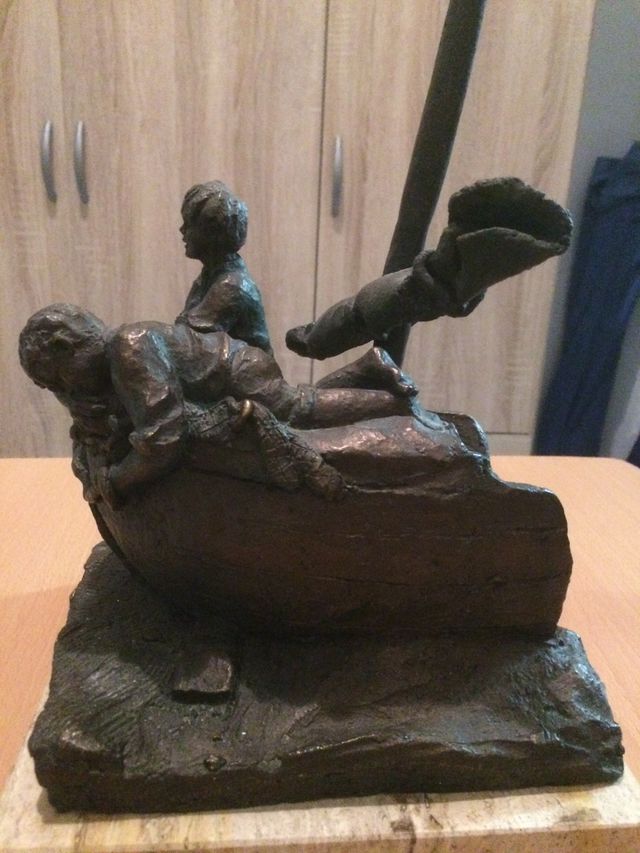 Figura barca con niños