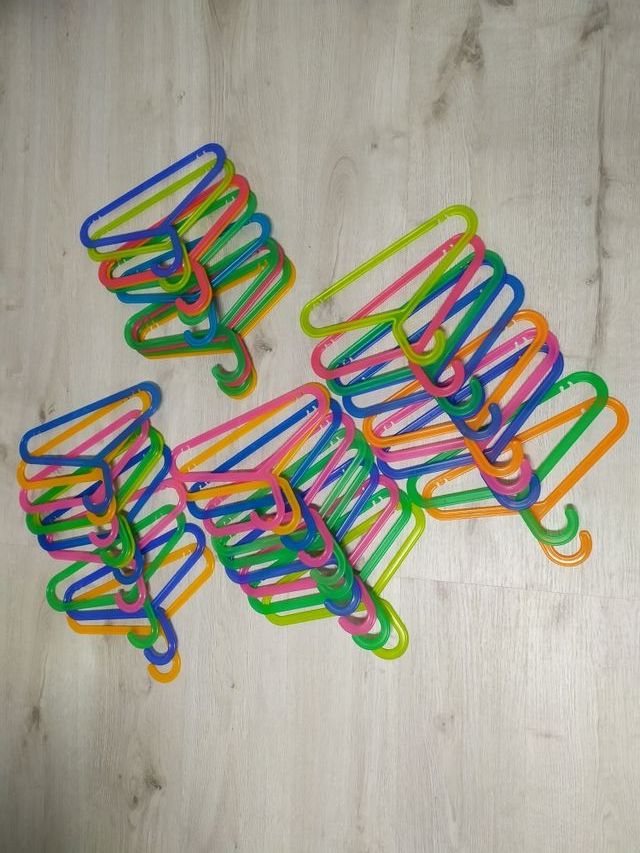 Lote 15 perchas de plástico